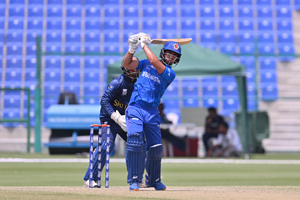 Ijaz Ahmad plays a straight lofted drive on his way to a solid 35-run knock