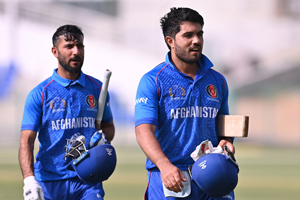 The skipper Darwish Rasooli and Ikram Alikhil Walk Back after chasing the Target