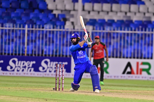 Mohammad Nabi plays a lofted shot towards the off-side
